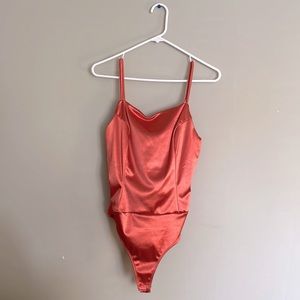 Orange satin bodysuit